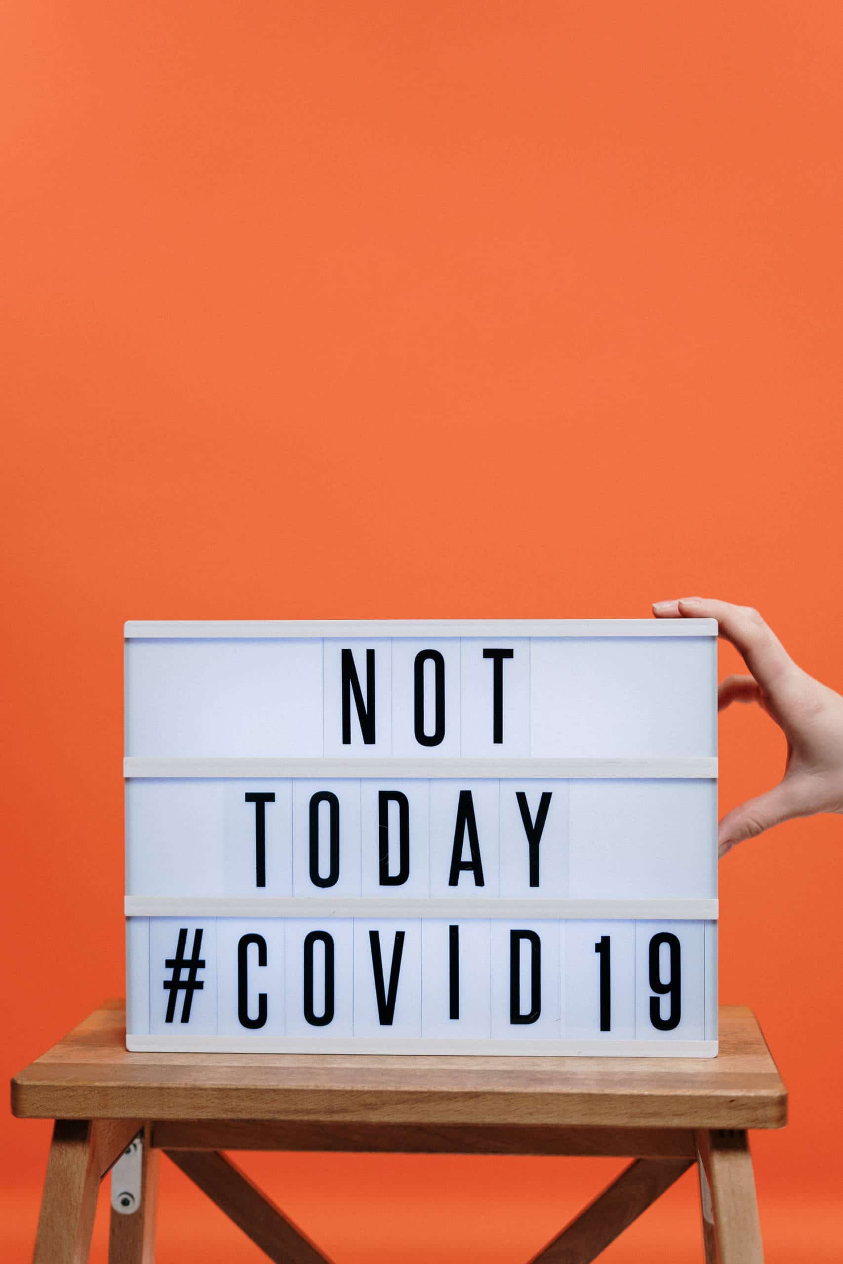 Canva Not Today Covid19 Sign On Wooden Stool scaled