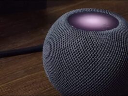 Apple Homepod Mini Sitting On A Desk