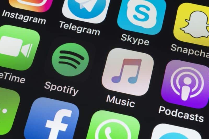 Spotify, Apple Music, Podcasts And Other Phone Apps On Iphone Screen